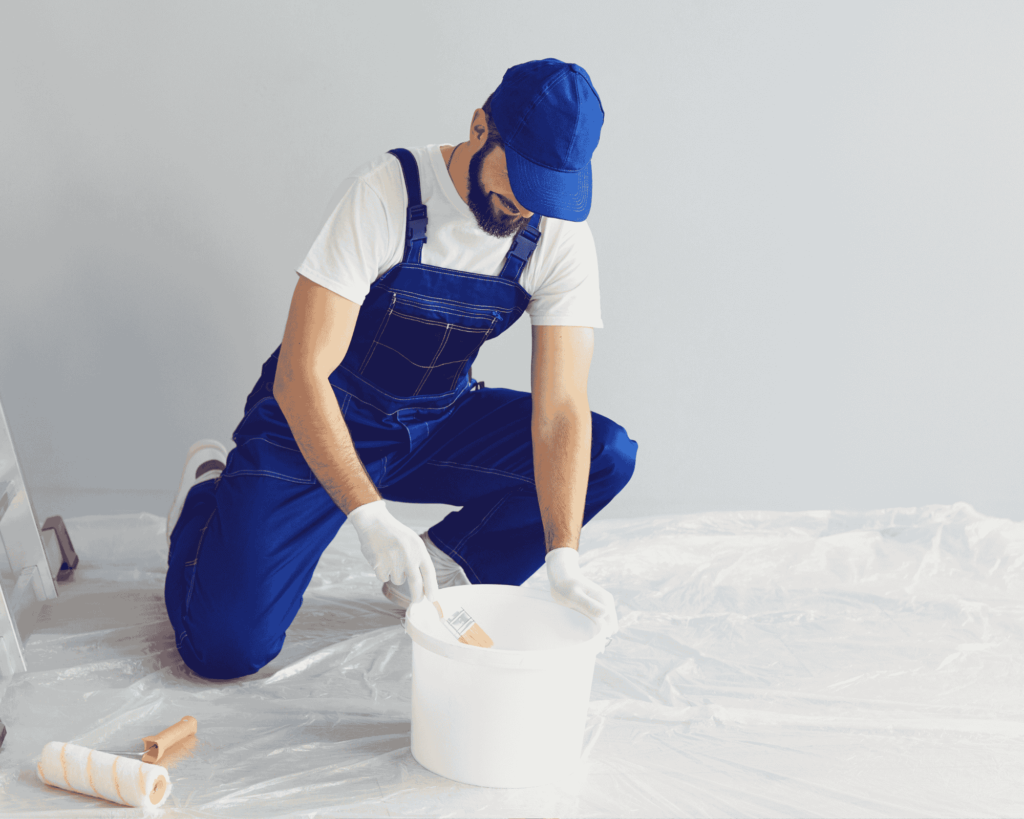 man preparing sealer as workmanship before painting 1 room hdb